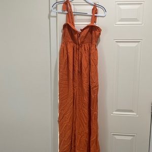 Free people xs orange pantsuit with tie straps